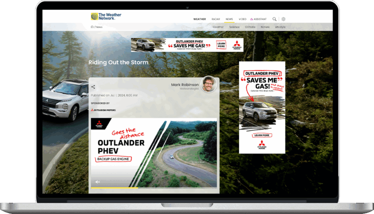 Mitsubishi Outlander PHEV ad displayed on a laptop screen