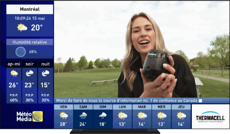Weather forecast screen with smiling woman holding a device outdoors