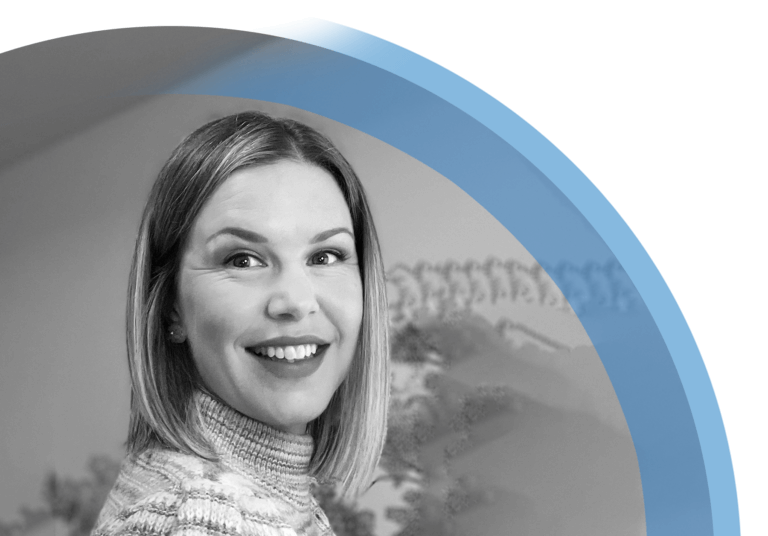 Portrait of a smiling woman in a sweater with a blue overlay
