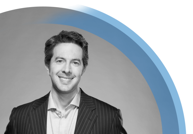 Smiling man in business attire with a modern graphic overlay